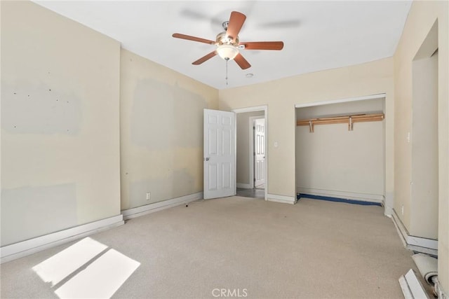 3561 E 6th St, Los Angeles, CA 90023 - unfurnished bedroom featuring carpet, a closet, and a ceiling fan