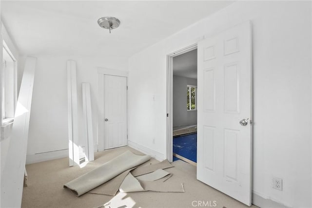 3561 E 6th St, Los Angeles, CA 90023 - empty room featuring carpet floors and baseboards