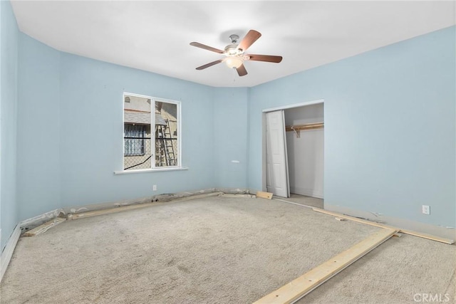 3561 E 6th St, Los Angeles, CA 90023 - unfurnished bedroom featuring carpet flooring, a closet, and a ceiling fan