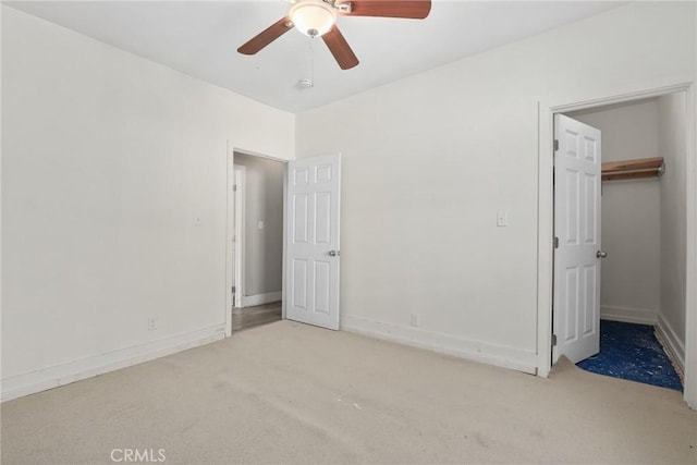 3561 E 6th St, Los Angeles, CA 90023 - unfurnished bedroom with carpet flooring, a walk in closet, and ceiling fan