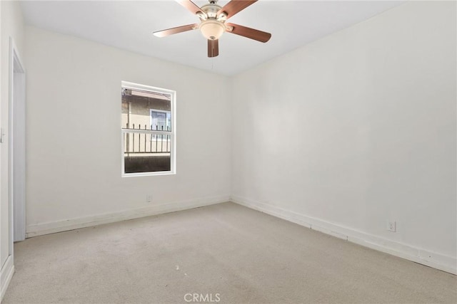 3561 E 6th St, Los Angeles, CA 90023 - carpeted spare room with baseboards and a ceiling fan