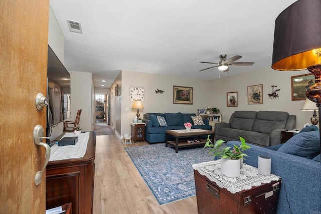 4396 Albatross Way, Oceanside, CA 92057 - living room featuring ceiling fan and light wood-style flooring