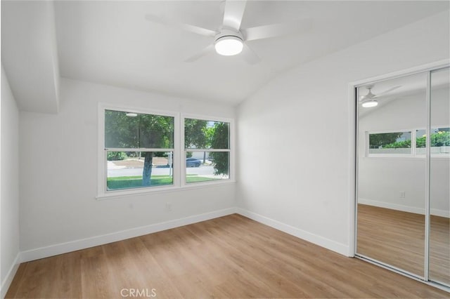 413 N Rimhurst Ave, Covina, CA 91724 - unfurnished bedroom with vaulted ceiling, a closet, wood finished floors, and ceiling fan