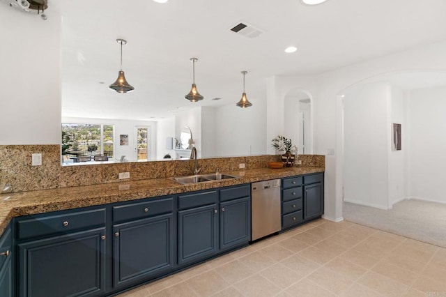 2534 Navarra Dr Unit C, Carlsbad, CA 92009 - kitchen with dishwasher, hanging light fixtures, tile counters, arched walkways, and recessed lighting