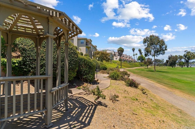 2534 Navarra Dr Unit C, Carlsbad, CA 92009 - view of grassy yard with a pergola