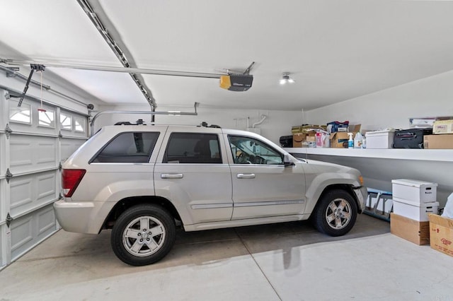 2534 Navarra Dr Unit C, Carlsbad, CA 92009 - garage featuring a garage door opener
