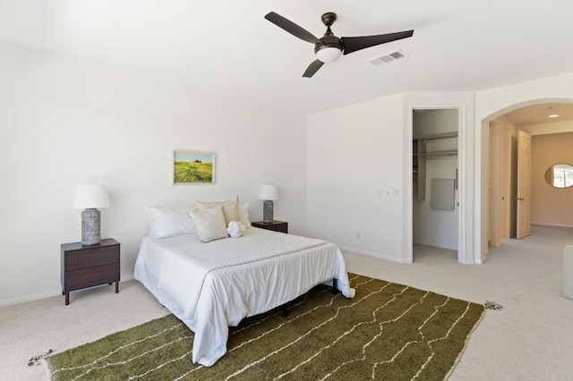 2534 Navarra Dr Unit C, Carlsbad, CA 92009 - carpeted bedroom featuring arched walkways and ceiling fan