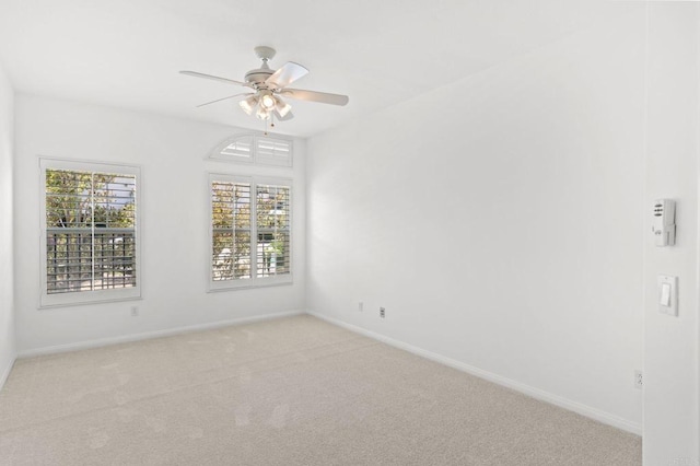2534 Navarra Dr Unit C, Carlsbad, CA 92009 - unfurnished room with plenty of natural light, ceiling fan, and light colored carpet