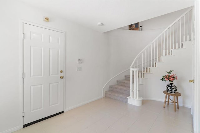 2534 Navarra Dr Unit C, Carlsbad, CA 92009 - entryway featuring stairway and tile patterned floors