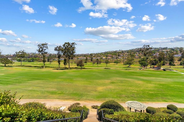 2534 Navarra Dr Unit C, Carlsbad, CA 92009 - surrounding community with golf course view and a lawn