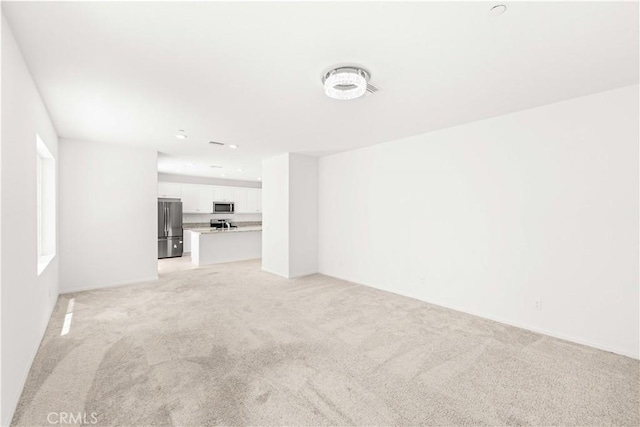 16017 Tanzinite Ln, Chino, CA 91708 - unfurnished living room with light carpet