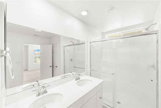 16017 Tanzinite Ln, Chino, CA 91708 - bathroom featuring a stall shower and double vanity