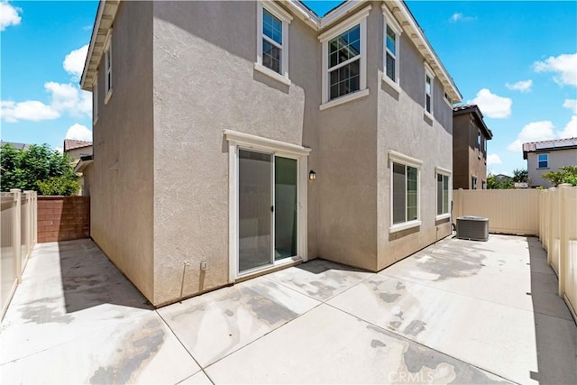 16017 Tanzinite Ln, Chino, CA 91708 - back of house with stucco siding, a patio, and a fenced backyard