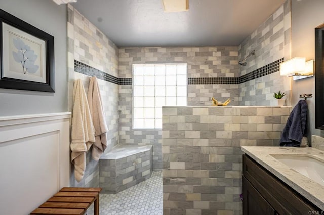 1926 Pamela Ln, Escondido, CA 92026 - full bathroom with tiled shower, vanity, tile walls, and tile patterned floors