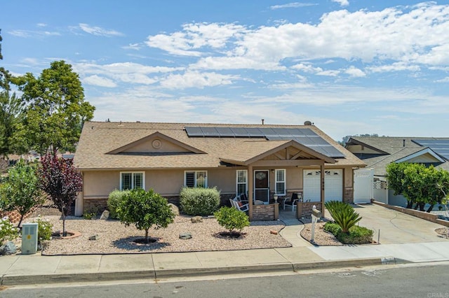 1926 Pamela Ln, Escondido, CA 92026 - ranch-style home featuring stucco siding, stone siding, solar panels, and a garage