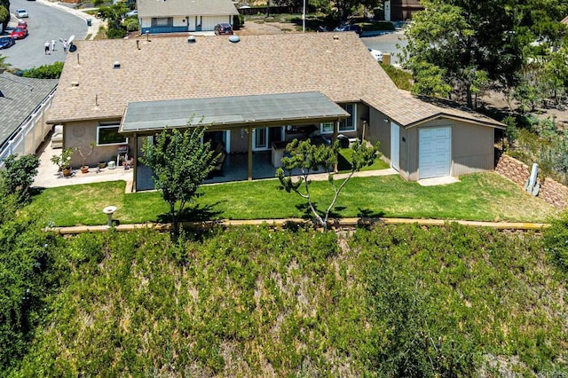 1926 Pamela Ln, Escondido, CA 92026 - view of front of home featuring a patio, a garage, stucco siding, a shed, and roof with shingles