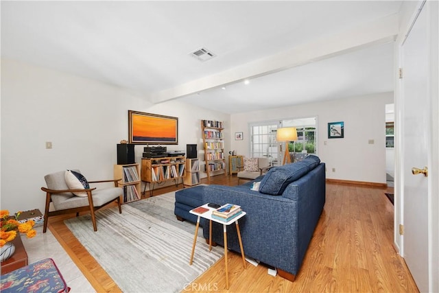 823 Daffodil, Riverside, CA 92507 - living area featuring beamed ceiling and light wood-style flooring