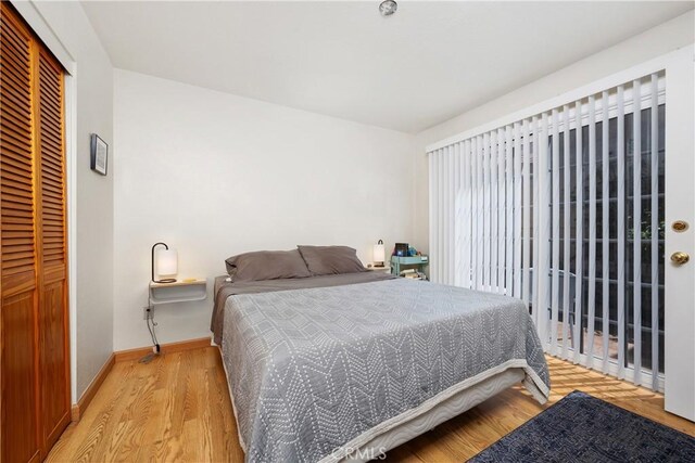 823 Daffodil, Riverside, CA 92507 - bedroom featuring light wood-style floors and a closet