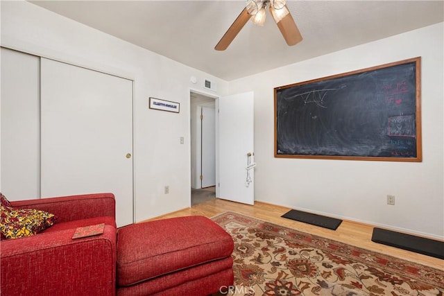 823 Daffodil, Riverside, CA 92507 - sitting room with ceiling fan and wood finished floors