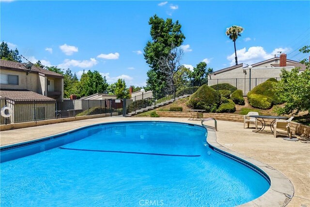 823 Daffodil, Riverside, CA 92507 - community pool featuring a patio