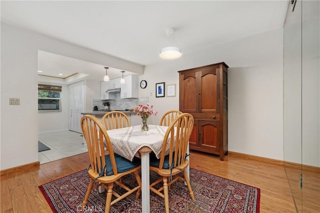 823 Daffodil, Riverside, CA 92507 - dining area featuring light wood-type flooring and baseboards