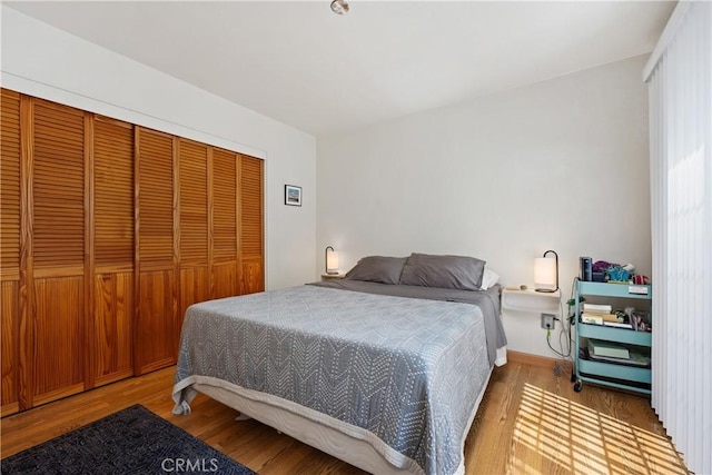 823 Daffodil, Riverside, CA 92507 - bedroom featuring wood finished floors and a closet