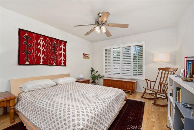 823 Daffodil, Riverside, CA 92507 - bedroom featuring light wood-style flooring and a ceiling fan
