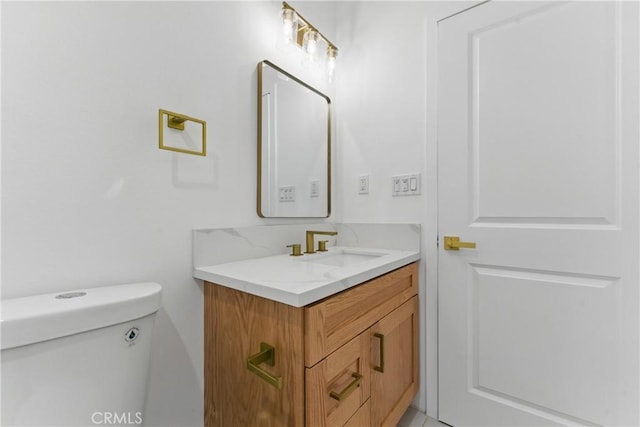 5171 S Wilton Pl, Los Angeles, CA 90062 - half bath featuring vanity and toilet