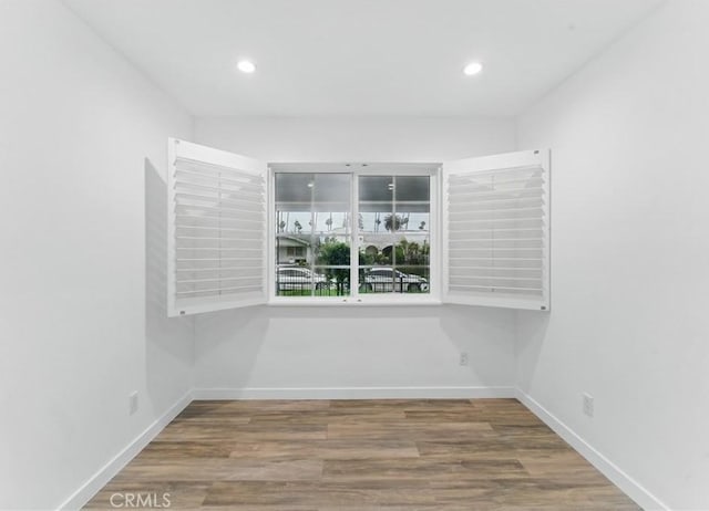 5171 S Wilton Pl, Los Angeles, CA 90062 - spare room featuring wood finished floors and recessed lighting