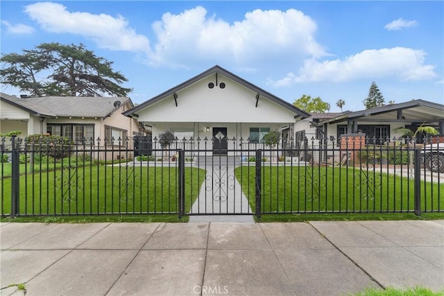 5171 S Wilton Pl, Los Angeles, CA 90062 - view of front facade with a fenced front yard, stucco siding, and an attached garage