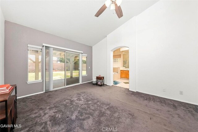 4018 Via Barbara, Lancaster, CA 93536 - empty room with arched walkways, ceiling fan, carpet, and high vaulted ceiling