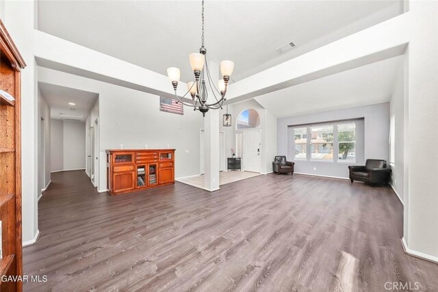 4018 Via Barbara, Lancaster, CA 93536 - unfurnished living room with a chandelier, wood finished floors, and vaulted ceiling