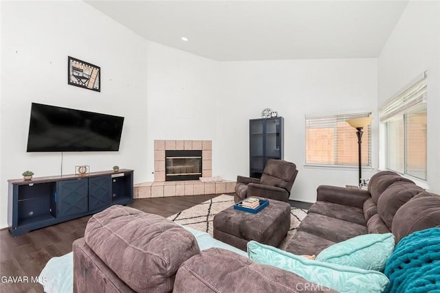 4018 Via Barbara, Lancaster, CA 93536 - living room featuring dark wood finished floors and a tile fireplace