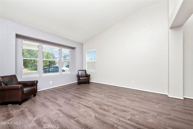 4018 Via Barbara, Lancaster, CA 93536 - sitting room with lofted ceiling and wood finished floors