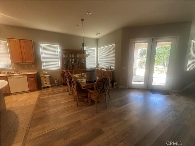 1185 Lantana Rd, Beaumont, CA 92223 - dining space with french doors and light wood-type flooring