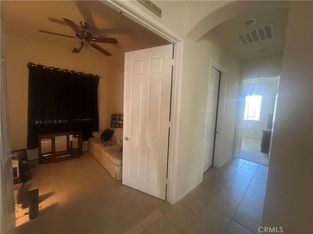 1185 Lantana Rd, Beaumont, CA 92223 - corridor featuring tile patterned floors and arched walkways