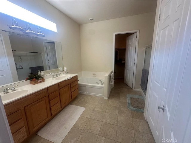 1185 Lantana Rd, Beaumont, CA 92223 - bathroom featuring a stall shower, a garden tub, double vanity, and tile patterned floors
