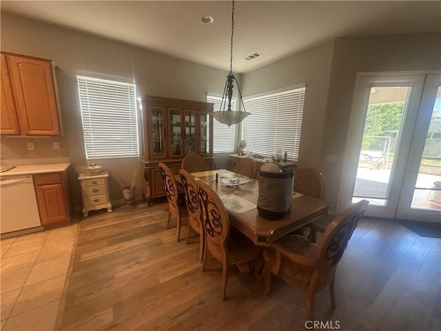 1185 Lantana Rd, Beaumont, CA 92223 - dining space featuring light wood-style floors and french doors