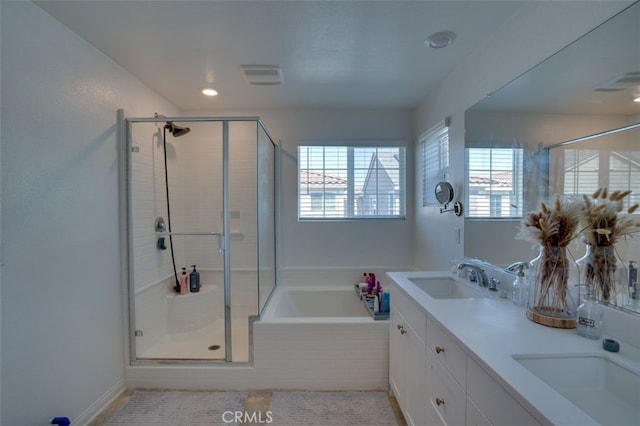 15147 Ridge Ln Unit 5, Fontana, CA 92336 - bathroom with a garden tub, a stall shower, double vanity, and recessed lighting