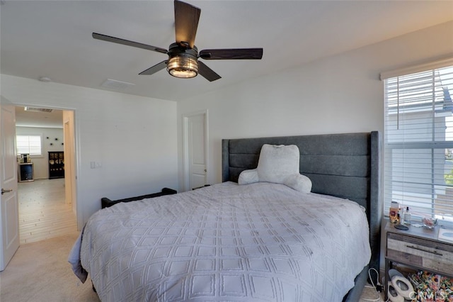 15147 Ridge Ln Unit 5, Fontana, CA 92336 - bedroom with a ceiling fan and light carpet