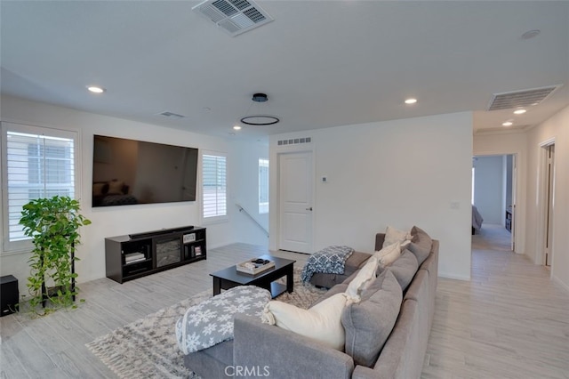 15147 Ridge Ln Unit 5, Fontana, CA 92336 - living area featuring light wood-type flooring and recessed lighting