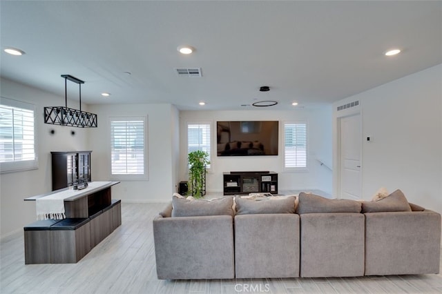 15147 Ridge Ln Unit 5, Fontana, CA 92336 - living area featuring plenty of natural light, recessed lighting, and light wood finished floors
