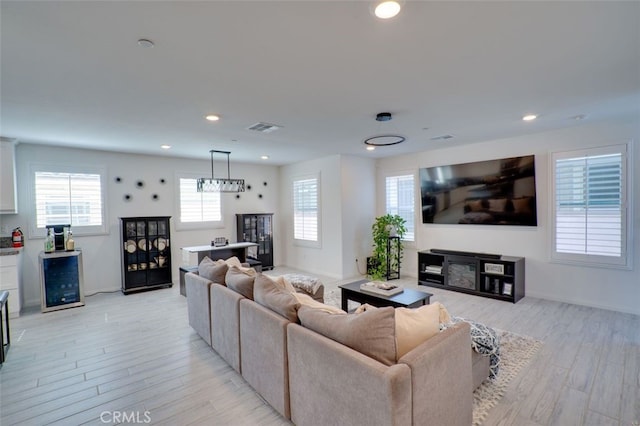 15147 Ridge Ln Unit 5, Fontana, CA 92336 - living area featuring plenty of natural light, light wood-style flooring, and recessed lighting