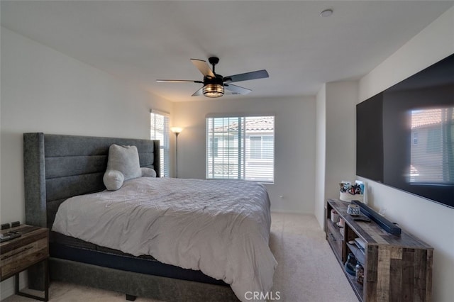 15147 Ridge Ln Unit 5, Fontana, CA 92336 - bedroom featuring light carpet and ceiling fan