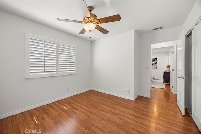 4161 E Fauna Ave, Anaheim, CA 92807 - unfurnished room featuring a ceiling fan and wood finished floors