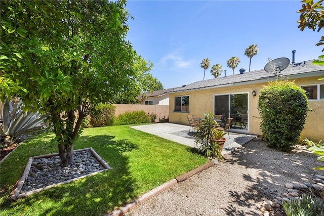 4161 E Fauna Ave, Anaheim, CA 92807 - fenced backyard with a patio