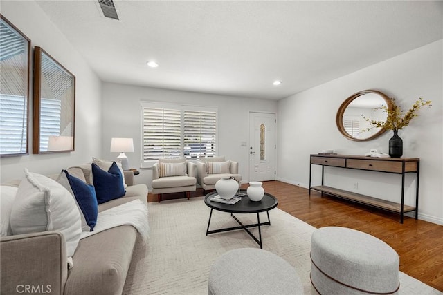 4161 E Fauna Ave, Anaheim, CA 92807 - living room with wood finished floors and recessed lighting
