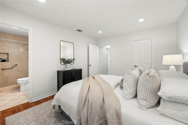 4161 E Fauna Ave, Anaheim, CA 92807 - bedroom with wood finished floors, recessed lighting, and ensuite bathroom