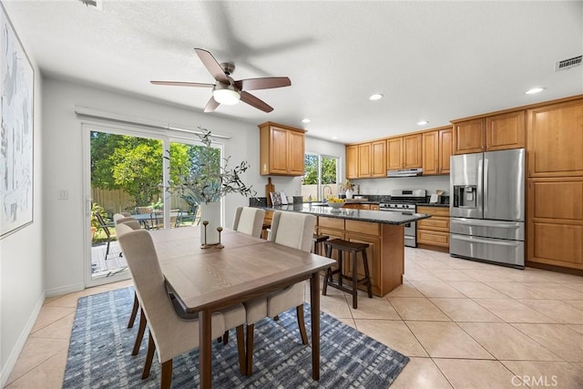4161 E Fauna Ave, Anaheim, CA 92807 - dining space with light tile patterned flooring, a ceiling fan, and recessed lighting