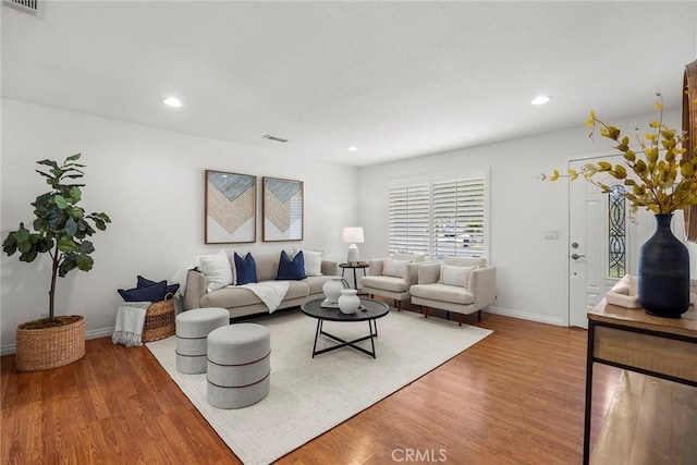 4161 E Fauna Ave, Anaheim, CA 92807 - living area featuring wood finished floors and recessed lighting